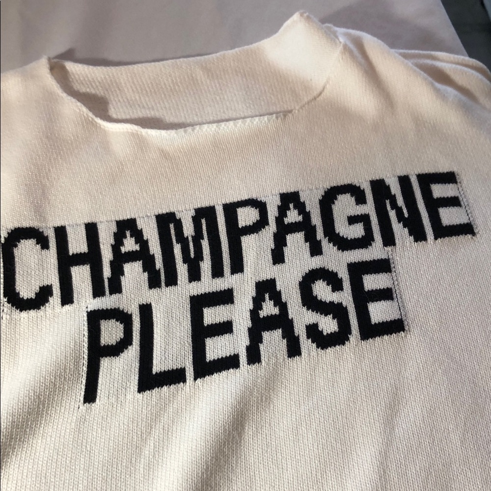 White Sweater with Black Text